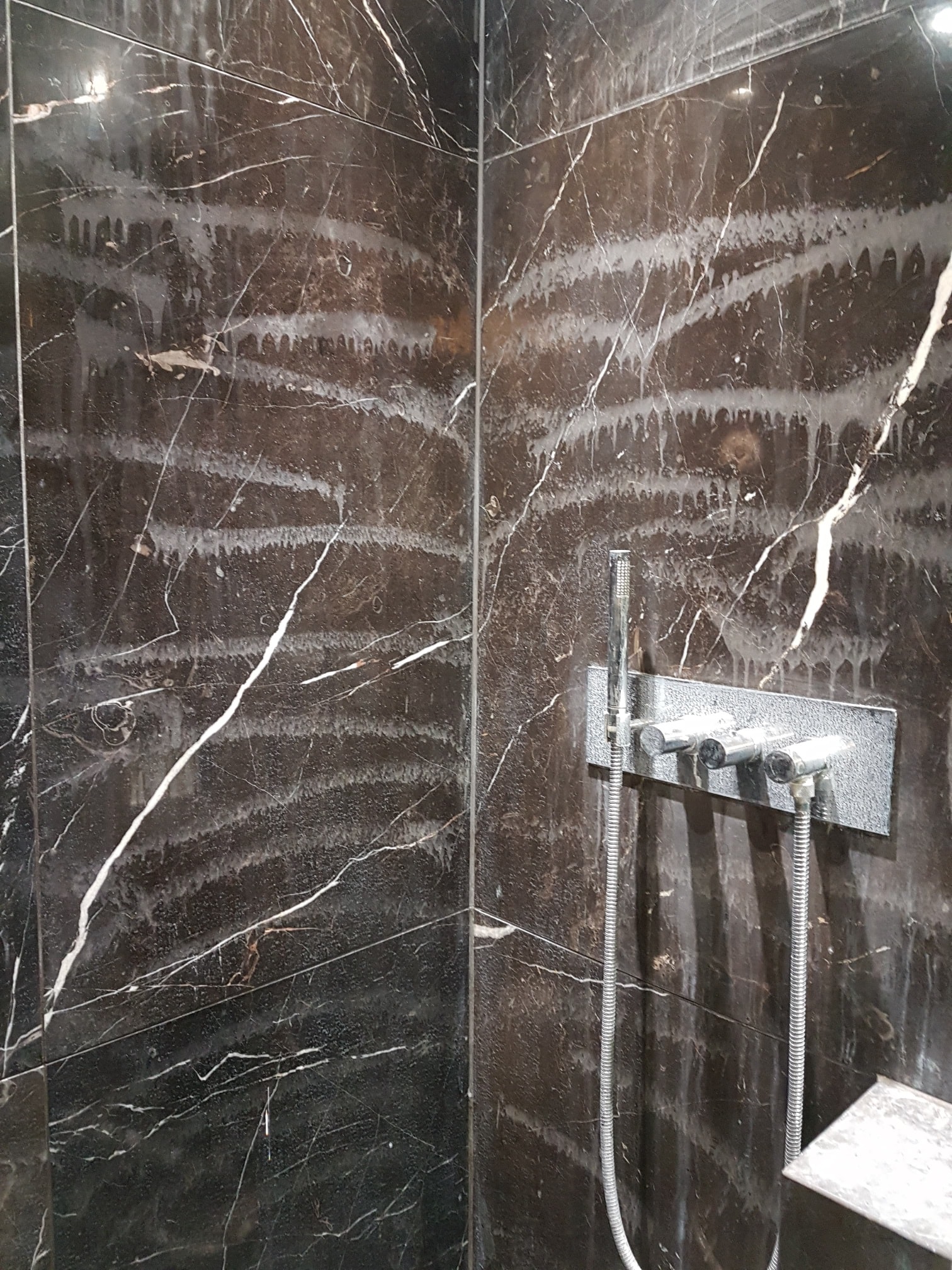 Damaged Marble Shower Wall Before Restoration Ealing